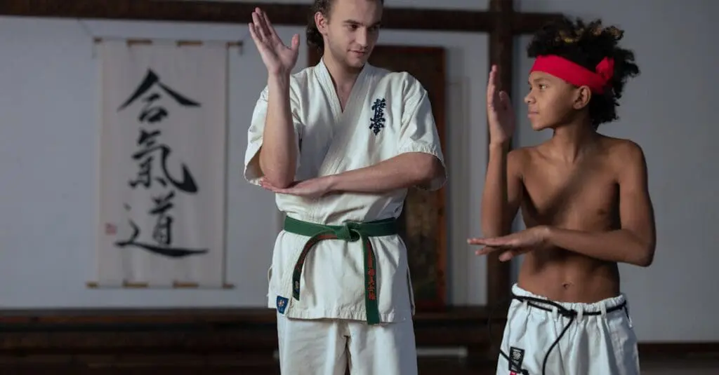 Martial arts training guide with instructor teaching basic defensive techniques