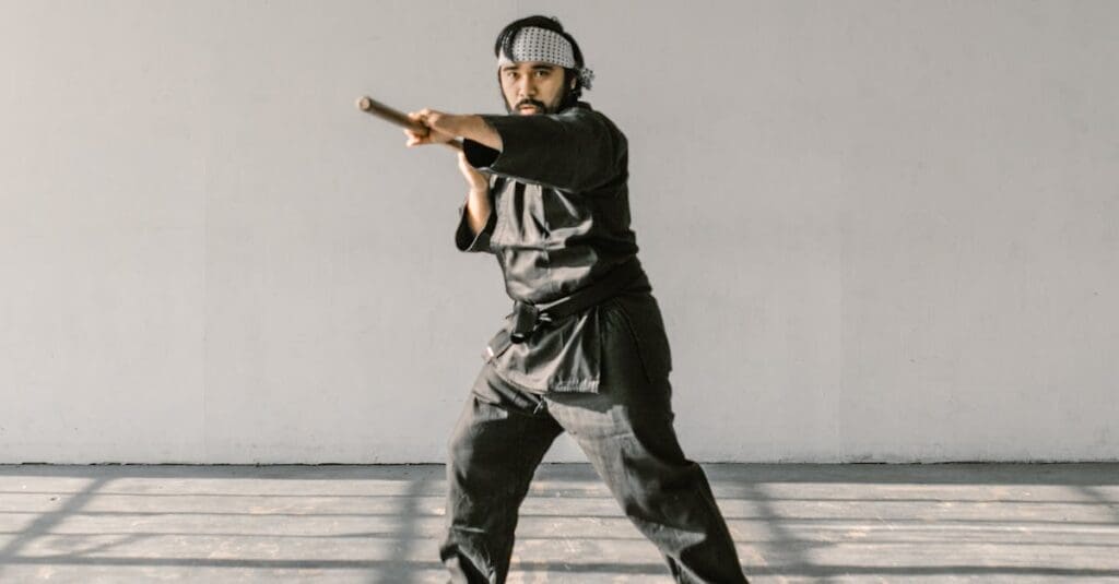 Traditional martial arts training guide demonstrating weapon stance practice